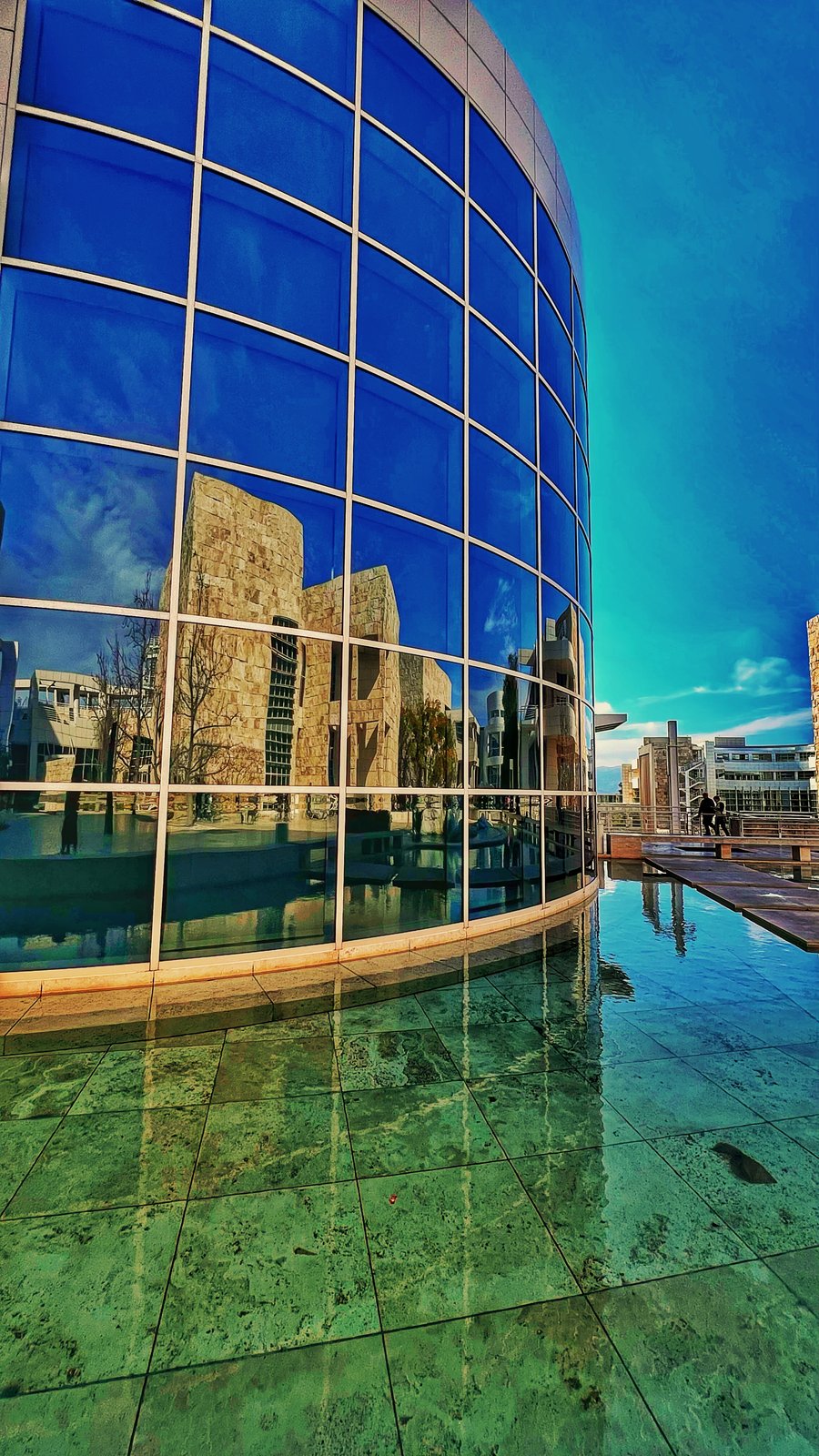 Getty Center — glass curve over water