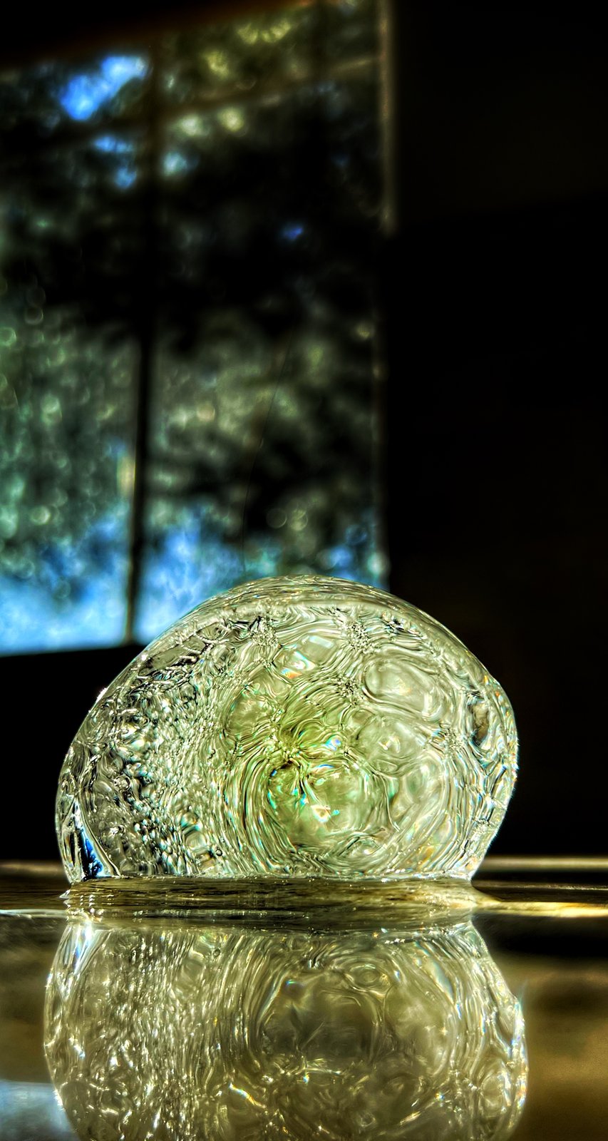 Glass orb, green and gold